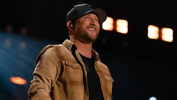 Cole Swindell visits the Atlanta Braves during Spring Training game