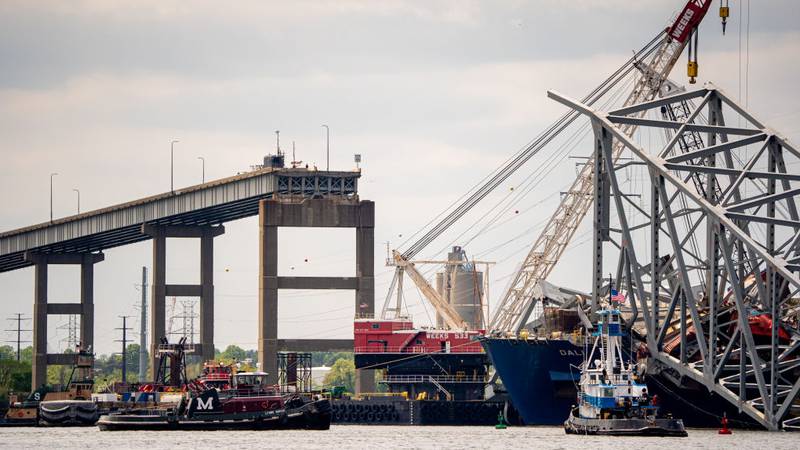BALTIMORE, MARYLAND - APRIL 25: Salvage crews continue to remove wreckage from the cargo ship Dali after the collapse of the Francis Scott Key Bridge on April 25, 2024 in Baltimore, Maryland. Four weeks since the maritime accident in the Patapsco River, a temporary channel opens today to allow ships stuck in the Port of Baltimore to leave. (Photo by Andrew Harnik/Getty Images)