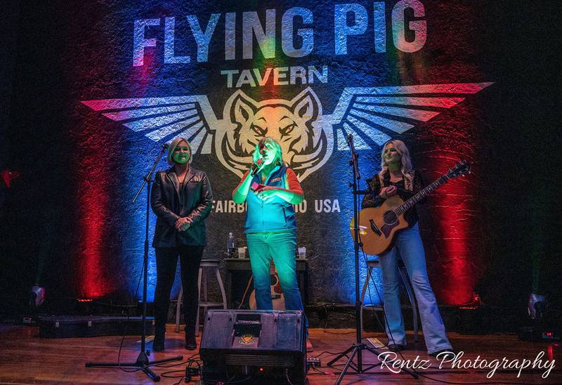 Check out your photos with Tigirlily Gold at The Flying Pig Tavern on Monday, February 27th, 2023.