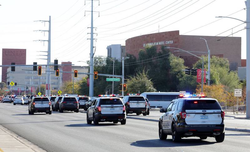 LAS VEGAS, NEVADA - DECEMBER 06: Las Vegas Metropolitan Police Department vehicles head toward the UNLV campus after a shooting on December 06, 2023 in Las Vegas, Nevada. According to Las Vegas Metro Police, a suspect is dead and multiple victims are reported after a shooting on the campus. (Photo by Ethan Miller/Getty Images)
